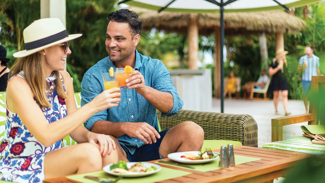 couple dining in a restaurant at Coco Beach Club