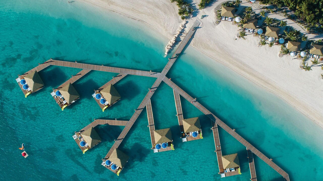 drone shot of the floating cabanas