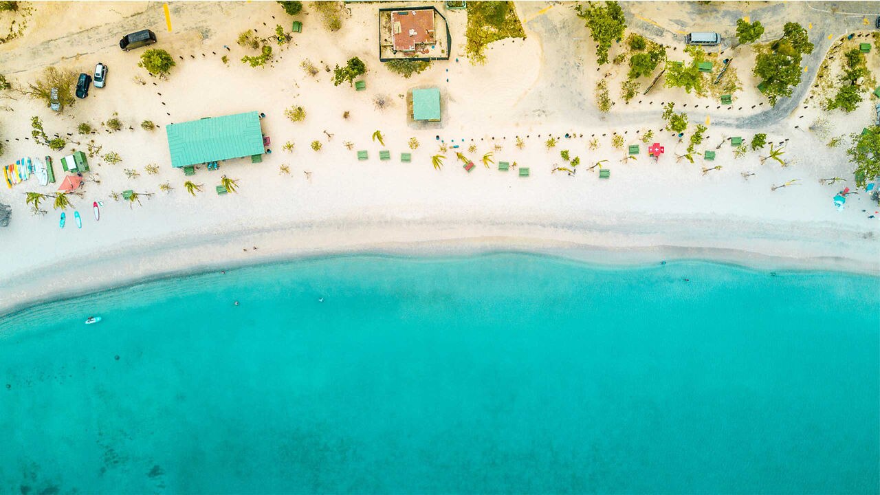 Two chairs on a tropical beach