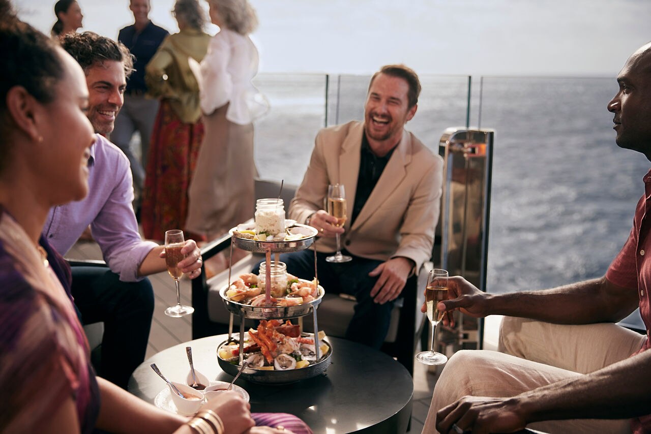 Group of People Dining Onboard